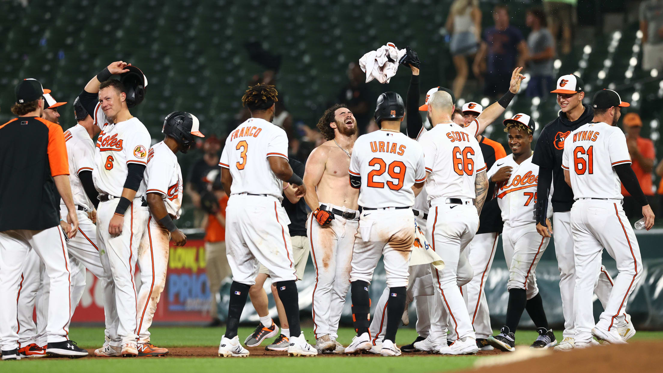 Ryan McKenna of the Baltimore Orioles and Austin Hays celebrate a