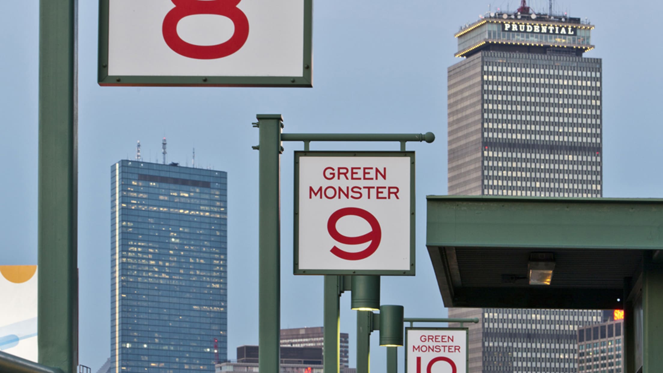 What is referred to as “The Green Monster” at Fenway Park? Why
