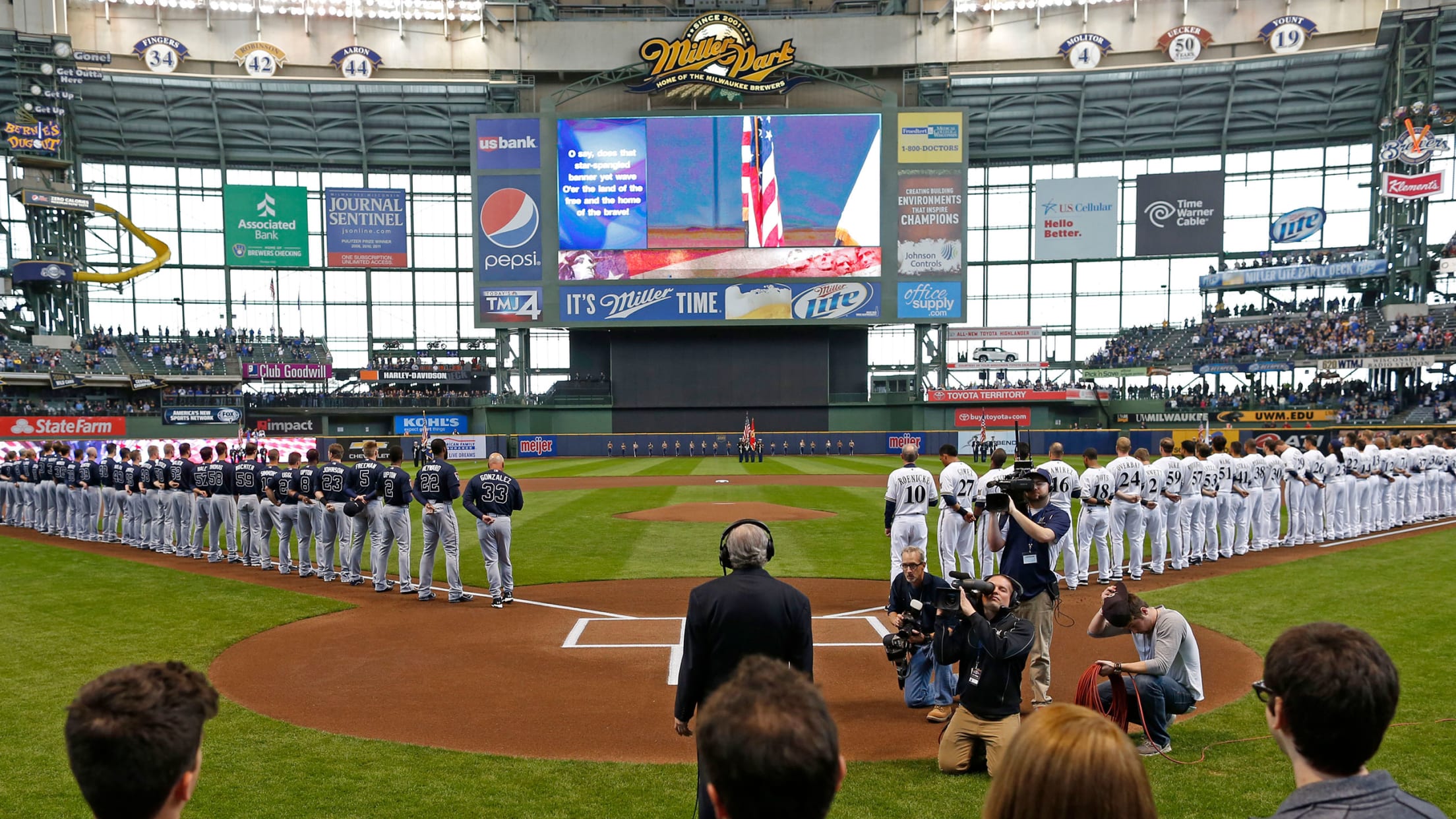 Brewers legend Cecil Cooper throws out first pitch at Brewers' Re-Opening  Day - Milwaukee Times Weekly Newspaper