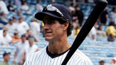 Retired New York Yankees player Paul O'Neill walks down the line