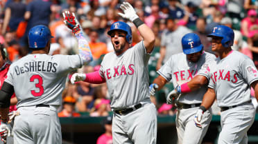 Postseason's first-ever walk-off slam lifts Rangers over Tigers, 7-3.