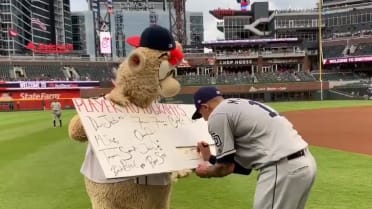 Video: Braves mascot Blooper tricks Manny Machado into signing