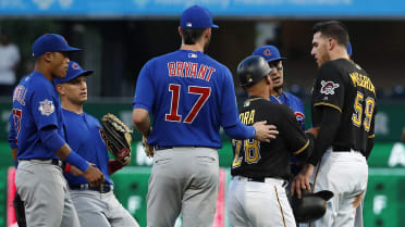 Cubs SS Javy Baez tosses bat past mound on strikeout, sails throw over  first base into stands