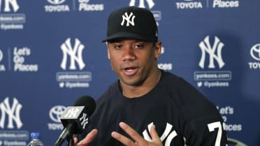 Yankees Minor Leaguer Russell Wilson threw out the ceremonial first pitch  at the Mariners game