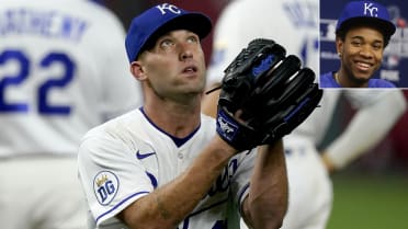 Kansas City Royals pitcher Danny Duffy talks to a fan wearing a jersey in  memory of Yordano Ventura, a Royals pitcher who was killed in a car crash  last month, during baseball