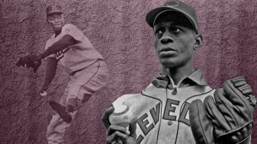 1952: St Louis Browns pitcher, Satchel Paige chats with teammates