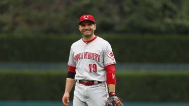 Votto traded his jersey for a Reds fan's shirt