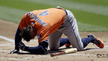 Springer leaves game after being hit on right hand by pitch