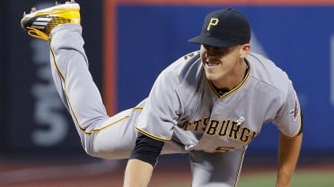 The Woodlands' Jameson Taillon pitches during a night game April