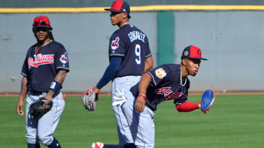 Cleveland Indians Francisco Lindor throws to first during fielding drills  at spring training in Goodyear, Arizona. Feb. 21,202…