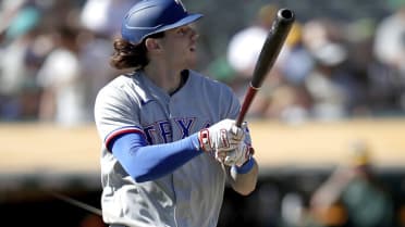 OAKLAND, CA - MAY 29: Texas Rangers catcher Jonah Heim (28) looks on during  a regular season game between the Oakland Athletics and Texas Rangers on  May 29, 2022, at RingCentral Coliseum