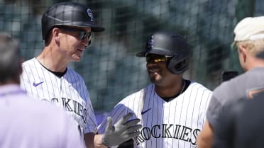 Russell Wilson, Peyton Manning visit Coors Field