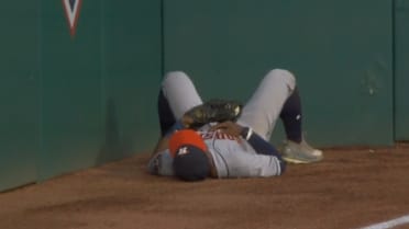 Tony Kemp makes a fantastic leaping grab at the left-field wall 