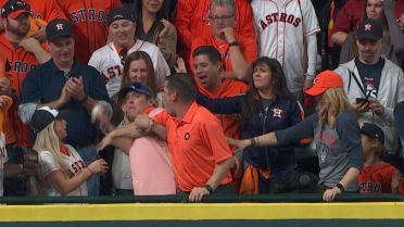 This Astros fan wore a helmet and batting gloves just in case the