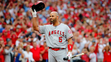 Pujols returns to his roots for hitting clinic