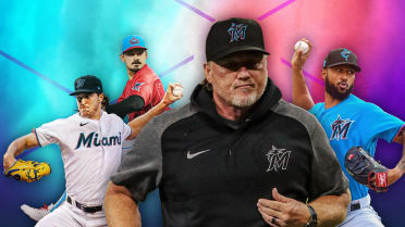 Miami Marlins pitching coach Mel Stottlemyre, center, talks with pitcher  Elieser Hernandez (57) during the first inning of the team's baseball game  against the Pittsburgh Pirates, Friday, Sept. 17, 2021, in Miami. (