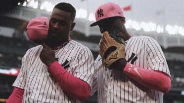 Think Pink! Baseball Players Wearing Pink Caps, Socks for Mother's
