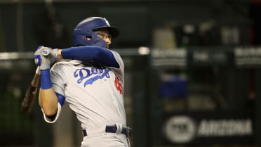 Los Angeles Dodgers' Edwin Rios celebrates with teammates after defeating  the Baltimore Orioles 7-3 during a baseball game, Tuesday, Sept. 10, 2019,  in Baltimore. The Dodgers clinched the National League West Division