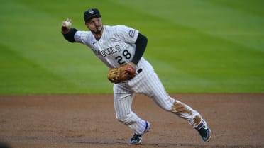Nolan Arenado,COL, with the 2106 NL Gold Glove for third base//April 7,  2017 v LAD