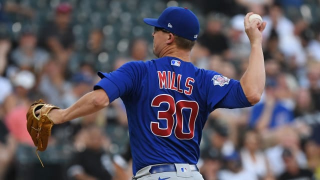 Chicago Cubs starting pitcher Alec Mills throws against the