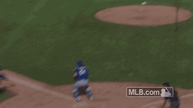 Phillips avoids tag at the plate