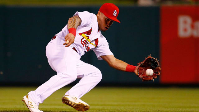 Rickie Fowler rolled up to Cardinals camp in his Ferrari to throw