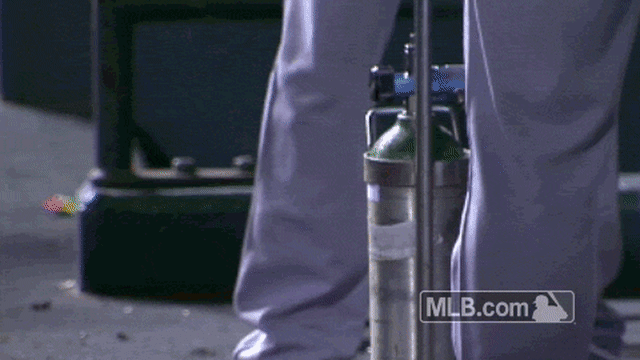 Carlos Martinez uses oxygen tank after scoring