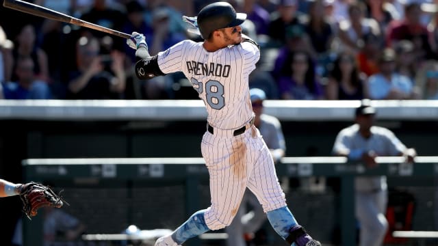 Coors Field outfield walls being raised