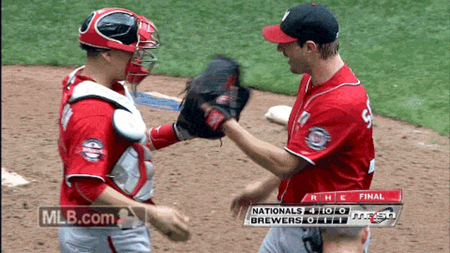 Washington Nationals Max Scherzer can only smile as he is drenched in  celebratory chocolate syrup after pitching a no-hitter against the  Pittsburgh Pirates at Nationals Park on June 20, 2015 in Washington