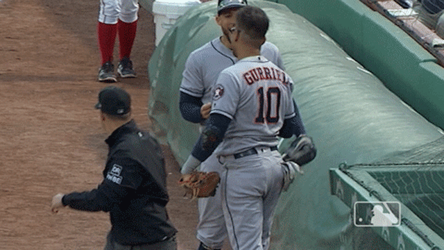Yuli Gurriel got stuck in the netting and George Springer couldn't stop  laughing