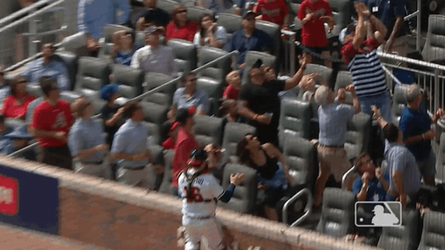 Chipper Jones flubs foul ball in stands at Braves' NLDS Game 3