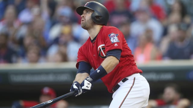 Twins Brian Dozier got a baseball stuck in the outfield padding