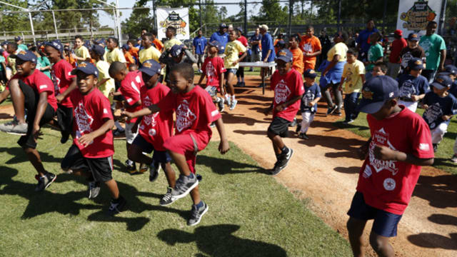 Houston kids participate in Astros baseball clinic · Buckner International