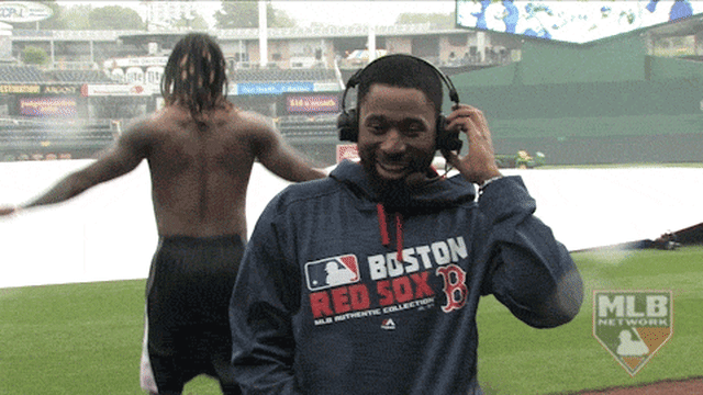 Ramirez dances, boxes in background of Bradley Interview