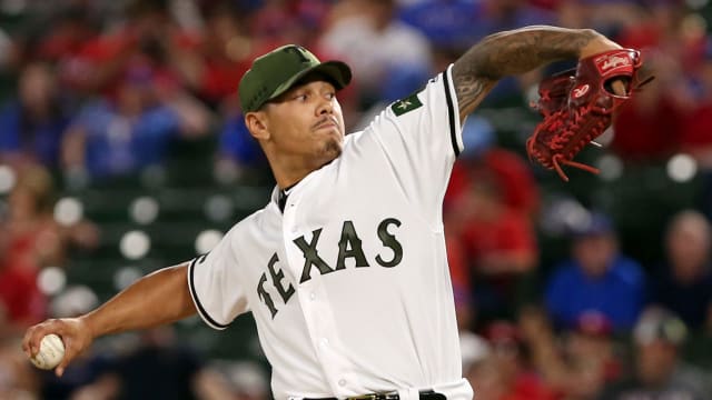 Fathers and sons of players took to the mound on Father's Day with some  impressive first pitches