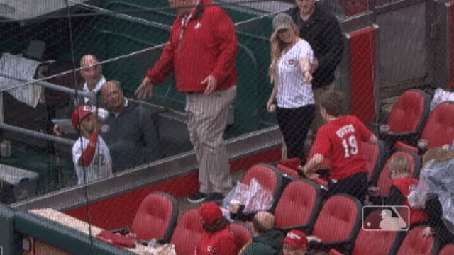 This young Cubs fan's reaction to catching Joey Votto's batting gloves was  priceless