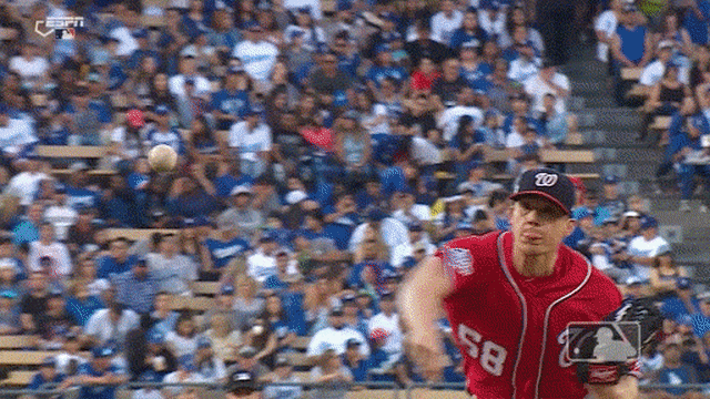 Chase Utley avoids being hit by a pitch