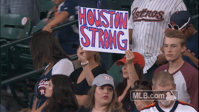 Astros fan holds up 'Houston Strong' sign