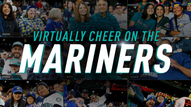 Seattle Mariners fans cheer their team after of a baseball game