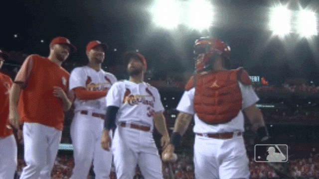 Yadier Molina threw a rosin bag in Adam Wainwright's face and gleefully  pointed to the camera