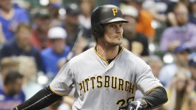 Water pours off the hair of Pittsburgh Pirates' John Jaso after he