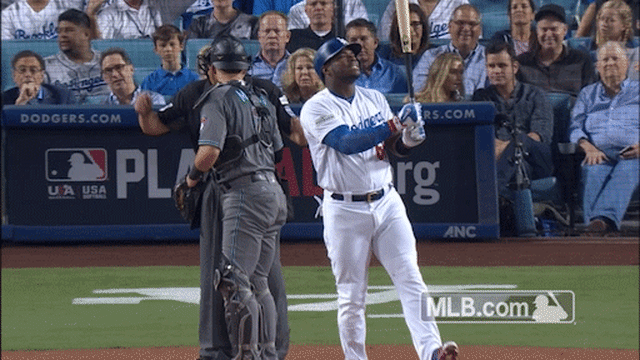 Dodgers' Yasiel Puig launches himself tongue-first into October