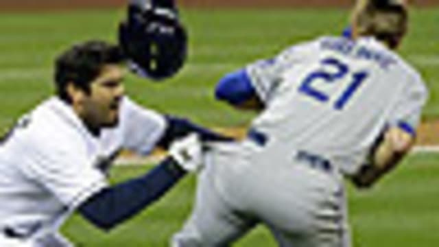 Zack Greinke, Dodgers star pitcher, breaks collarbone in brawl with Padres  - CBS News