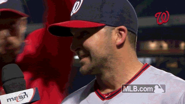 Washington Nationals Max Scherzer can only smile as he is drenched in  celebratory chocolate syrup after pitching a no-hitter against the  Pittsburgh Pirates at Nationals Park on June 20, 2015 in Washington