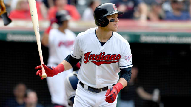 Indians' rallies fall short in extra-innings loss