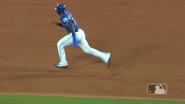Delino DeShields crosses home on an error from first base