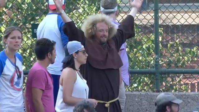 This giant-haired costumed Padres fan really loves foul balls