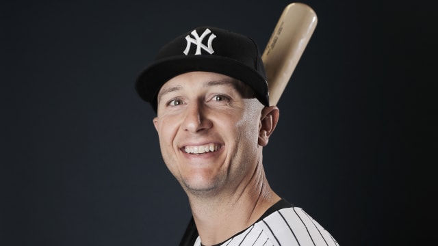 Troy Tulowitzki worked on his pitching mechanics during Blue Jays photo day