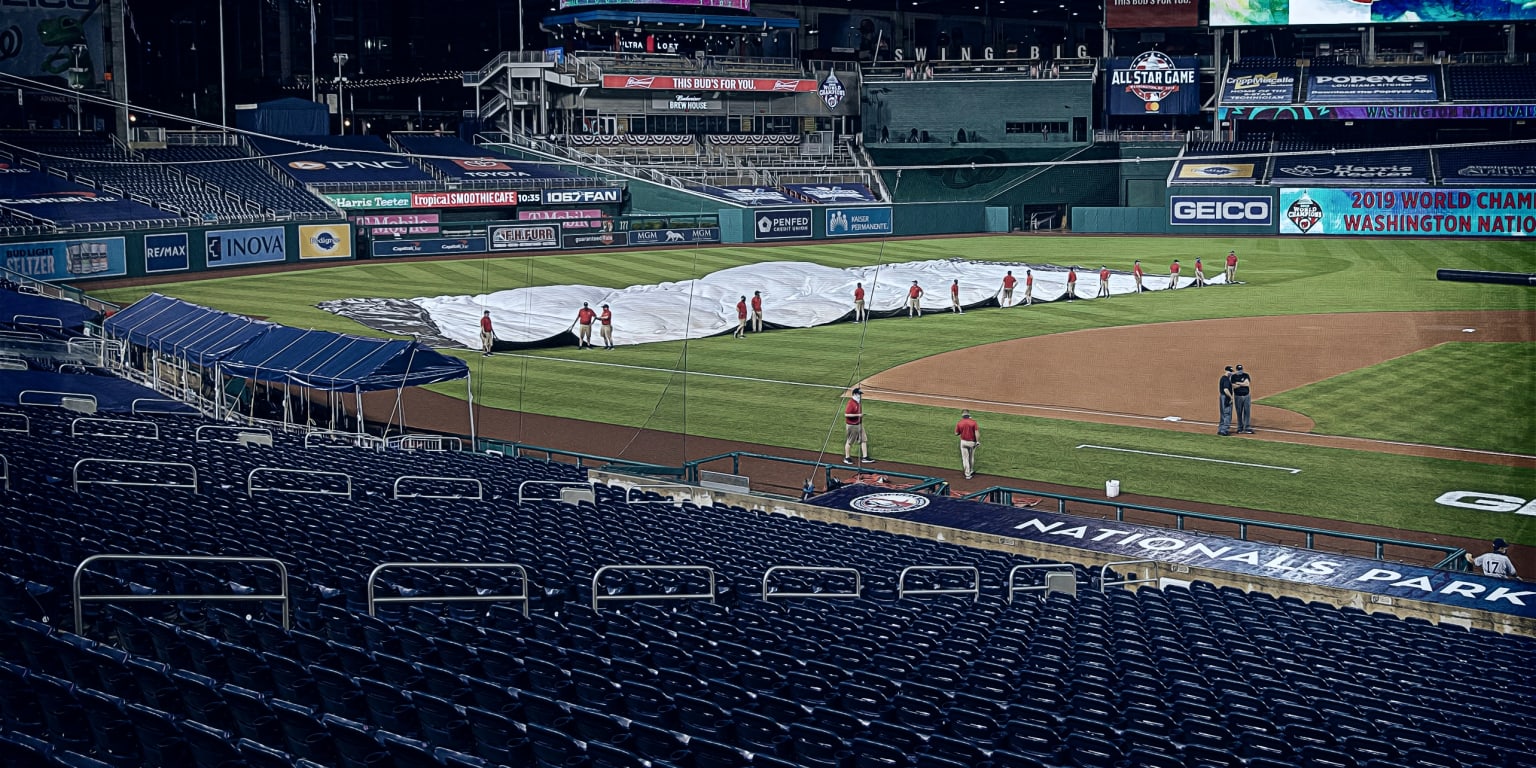 Pandemic-shortened MLB season kicks off with rain-shortened game