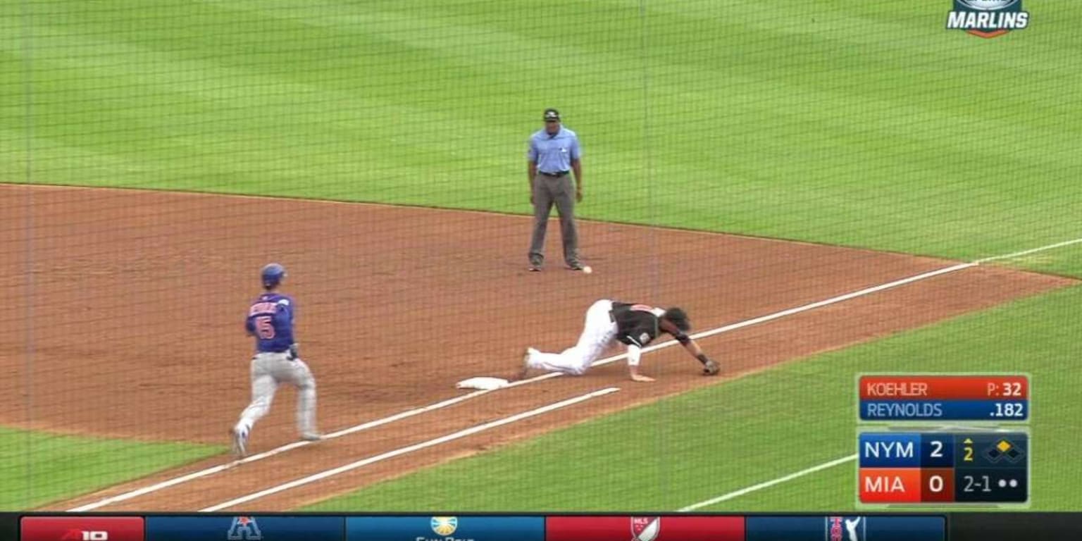 Secondbase umpire demonstrates proper execution of the elegant 'duck